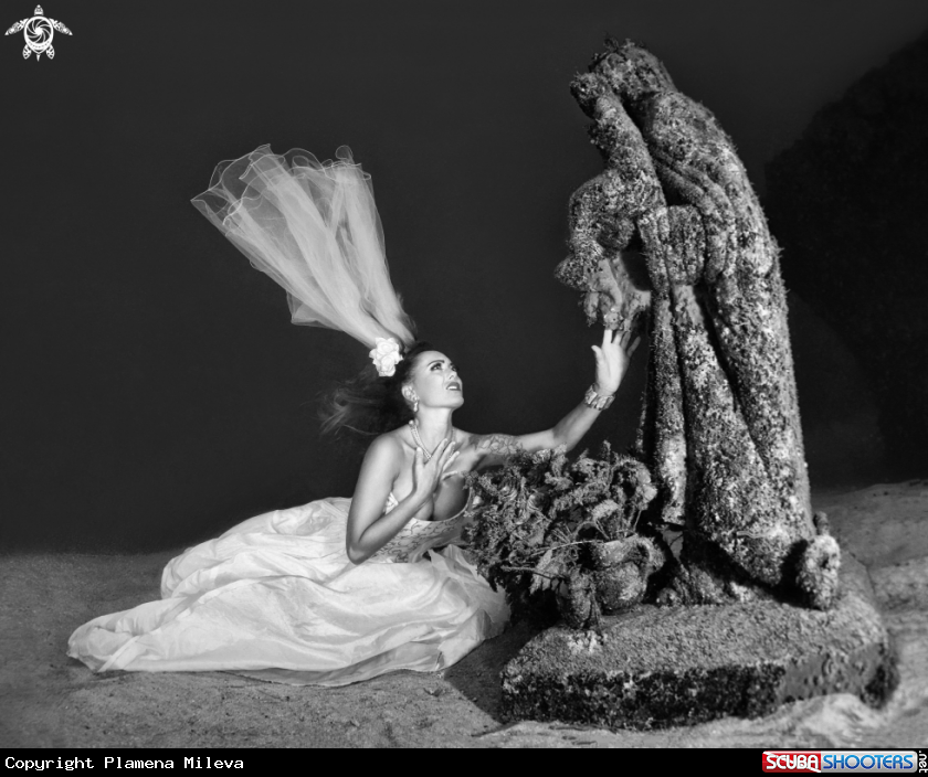 A Sculpture of Virgen Maria del Carmen & uw model