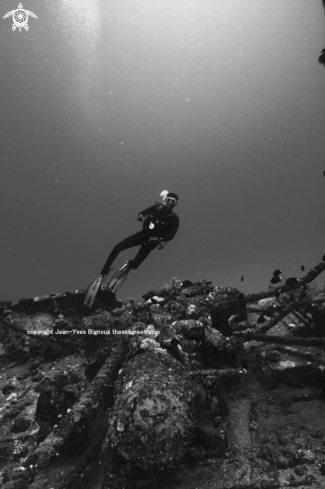 A Diver on the Silver Star shipwreck 35m Coin de Mire,Mauritius