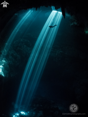 Light beams at the Pit Cenote